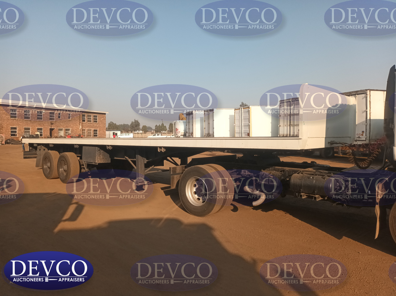 2004 Burg Double Axle Flatdeck Trailer | Devco Auction