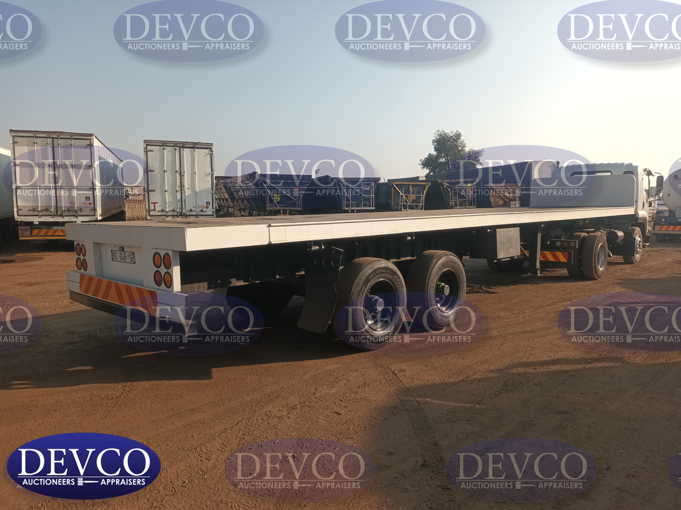 2004 Burg Double Axle Flatdeck Trailer | Devco Auction
